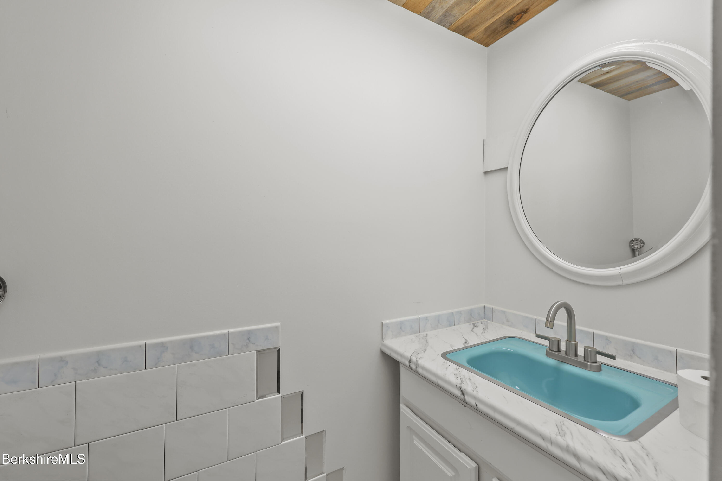 192 Curran Road Cheshire, MA 01225 - Photo 28 of 50 a bathroom with a sink and a mirror