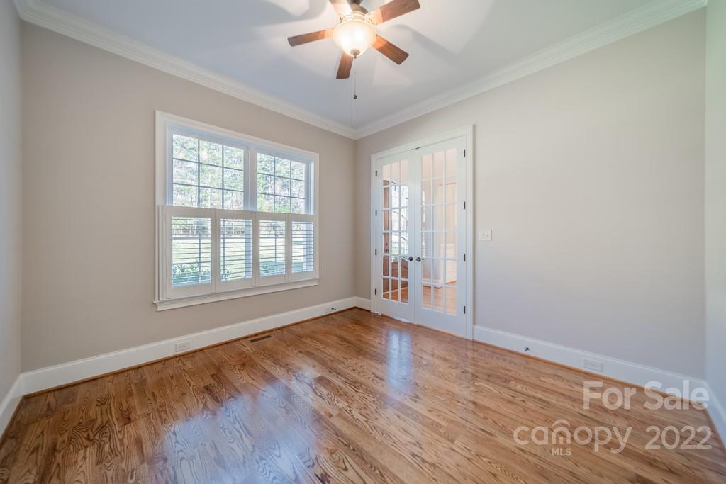 144 Greyfriars Road Mooresville, NC 28117 - Photo 11 of 43 wooden floor in an empty room with a window