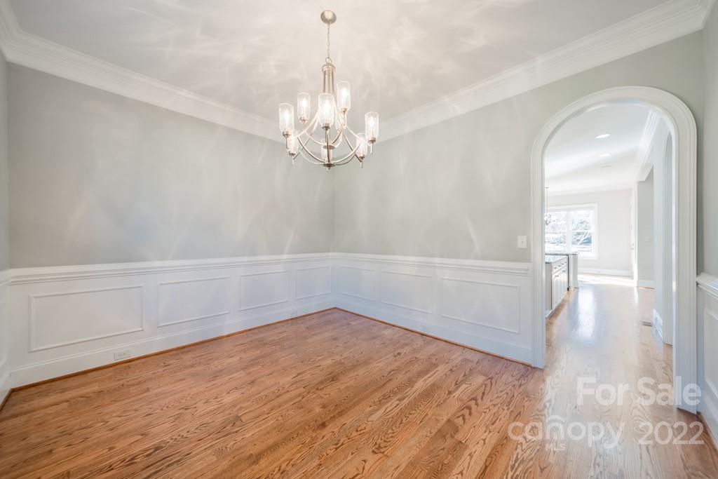 144 Greyfriars Road Mooresville, NC 28117 - Photo 12 of 43 wooden floor in an empty room with a window