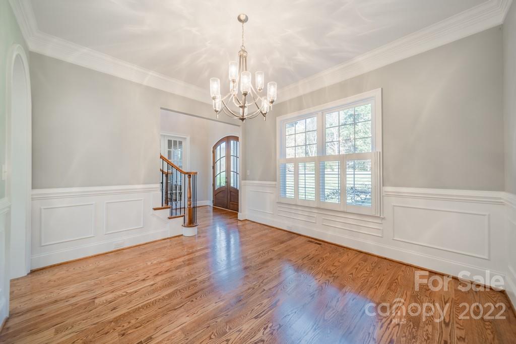144 Greyfriars Road Mooresville, NC 28117 - Photo 13 of 43 a view of livingroom with hardwood floor and window