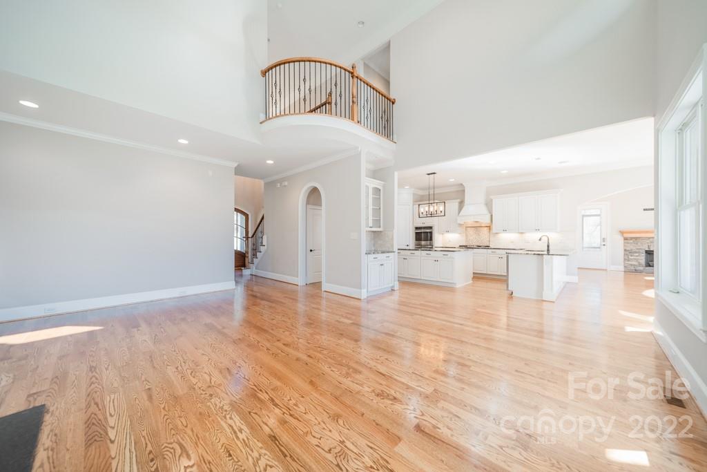 144 Greyfriars Road Mooresville, NC 28117 - Photo 22 of 43 a view of kitchen with furniture and wooden floor