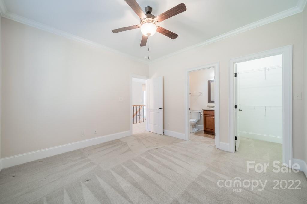 144 Greyfriars Road Mooresville, NC 28117 - Photo 30 of 43 a view of empty room with a ceiling fan