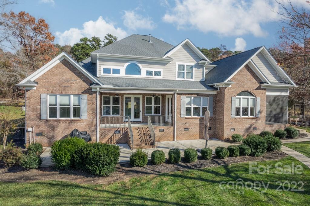 144 Greyfriars Road Mooresville, NC 28117 - Photo 35 of 43 a front view of a house with a yard