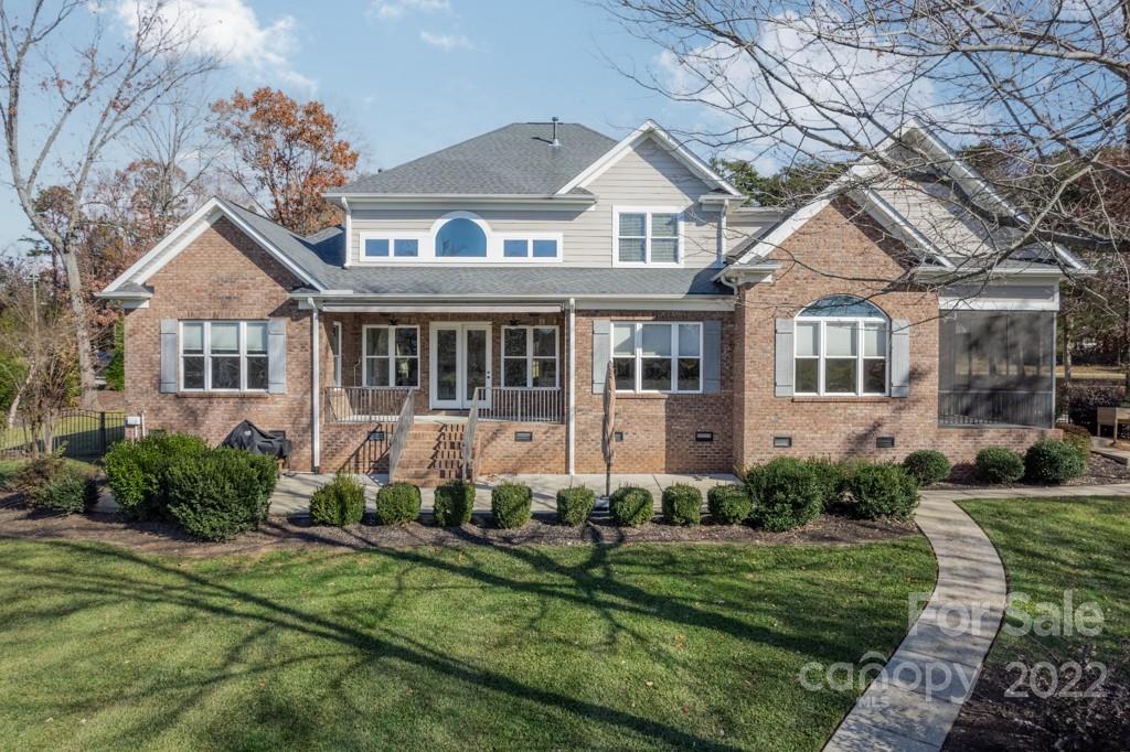144 Greyfriars Road Mooresville, NC 28117 - Photo 5 of 43 a front view of a house with a yard