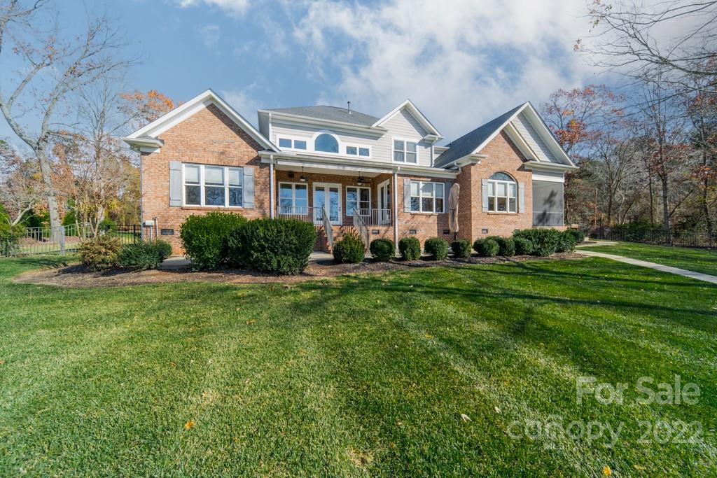 144 Greyfriars Road Mooresville, NC 28117 - Photo 6 of 43 a front view of a house with a yard