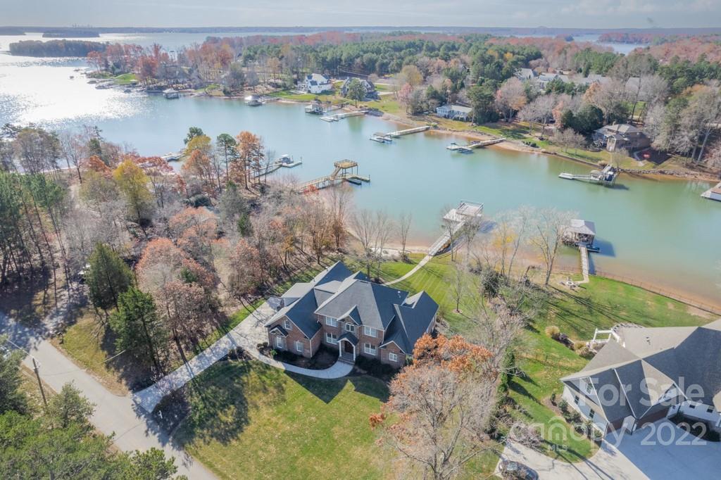 144 Greyfriars Road Mooresville, NC 28117 - Photo 7 of 43 an aerial view of a house with a lake view