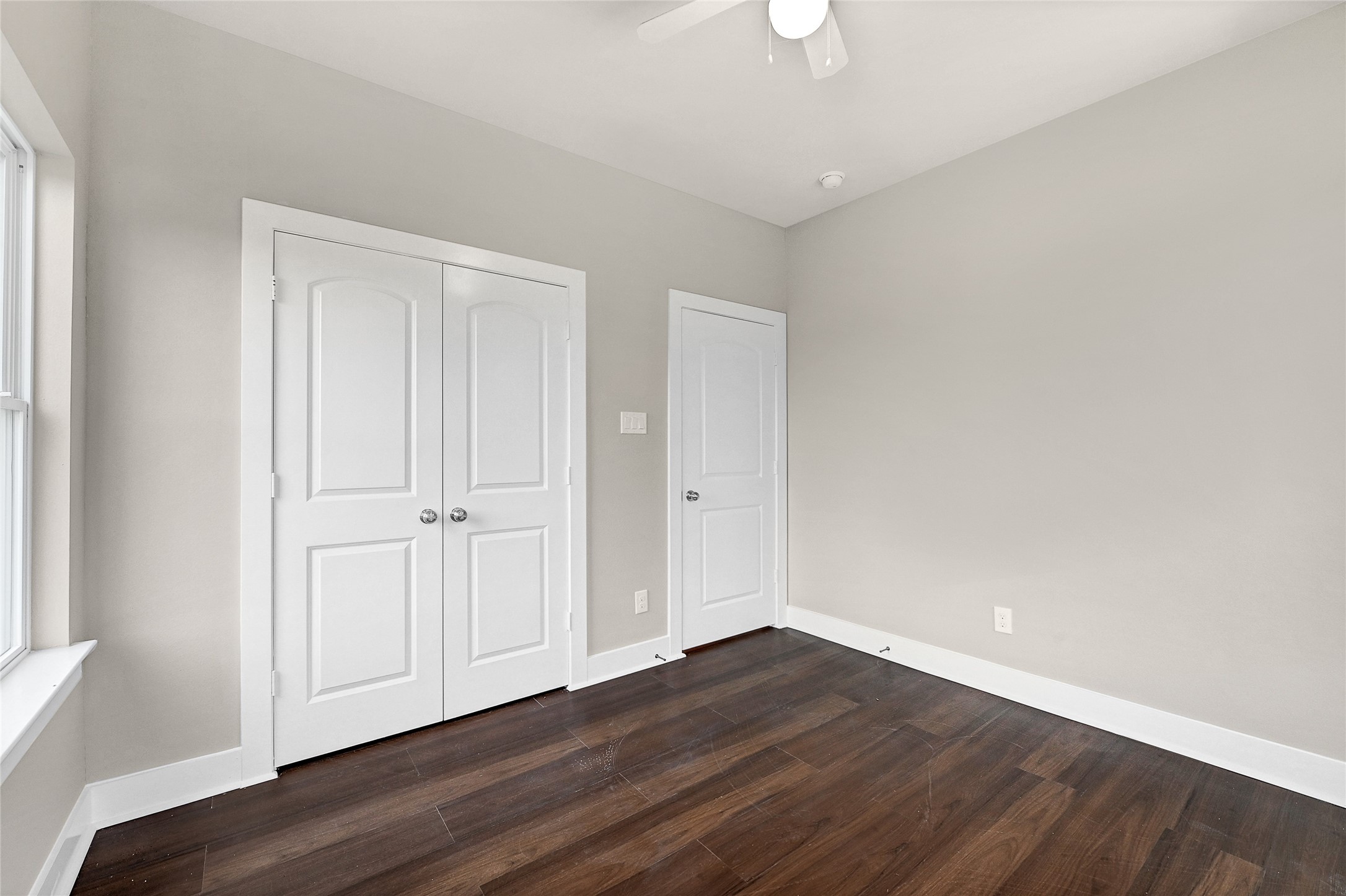 7938 Angus Street Houston, TX 77028 - Photo 18 of 25 a view of an empty room with wooden floor
