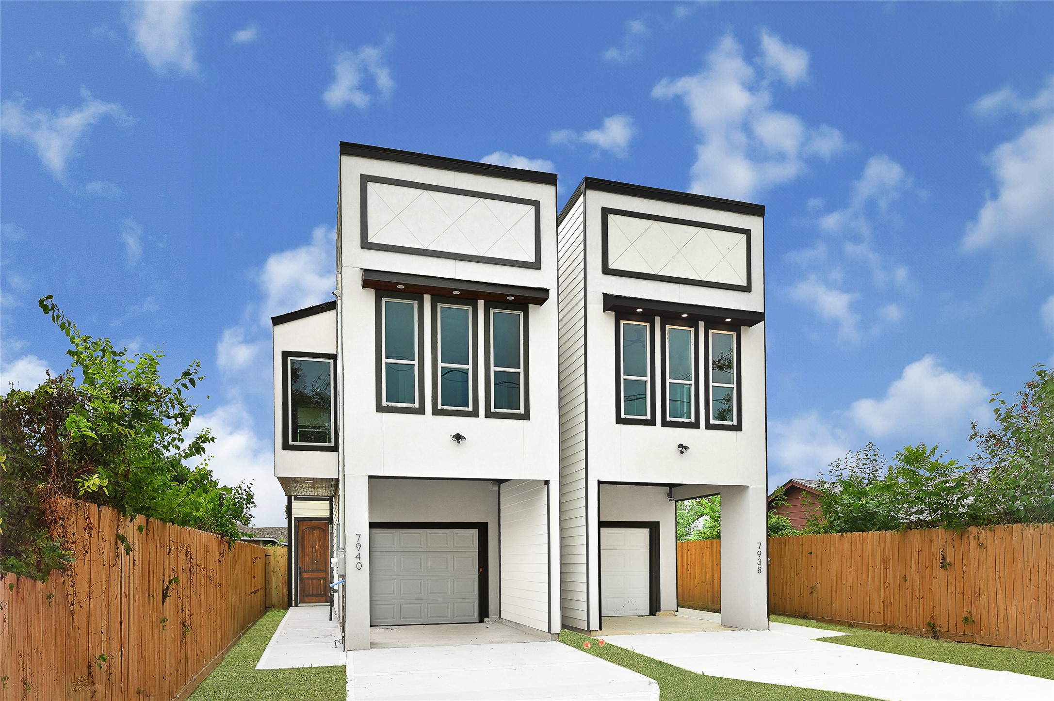 7938 Angus Street Houston, TX 77028 - Photo 2 of 25 a front view of a house with a garden