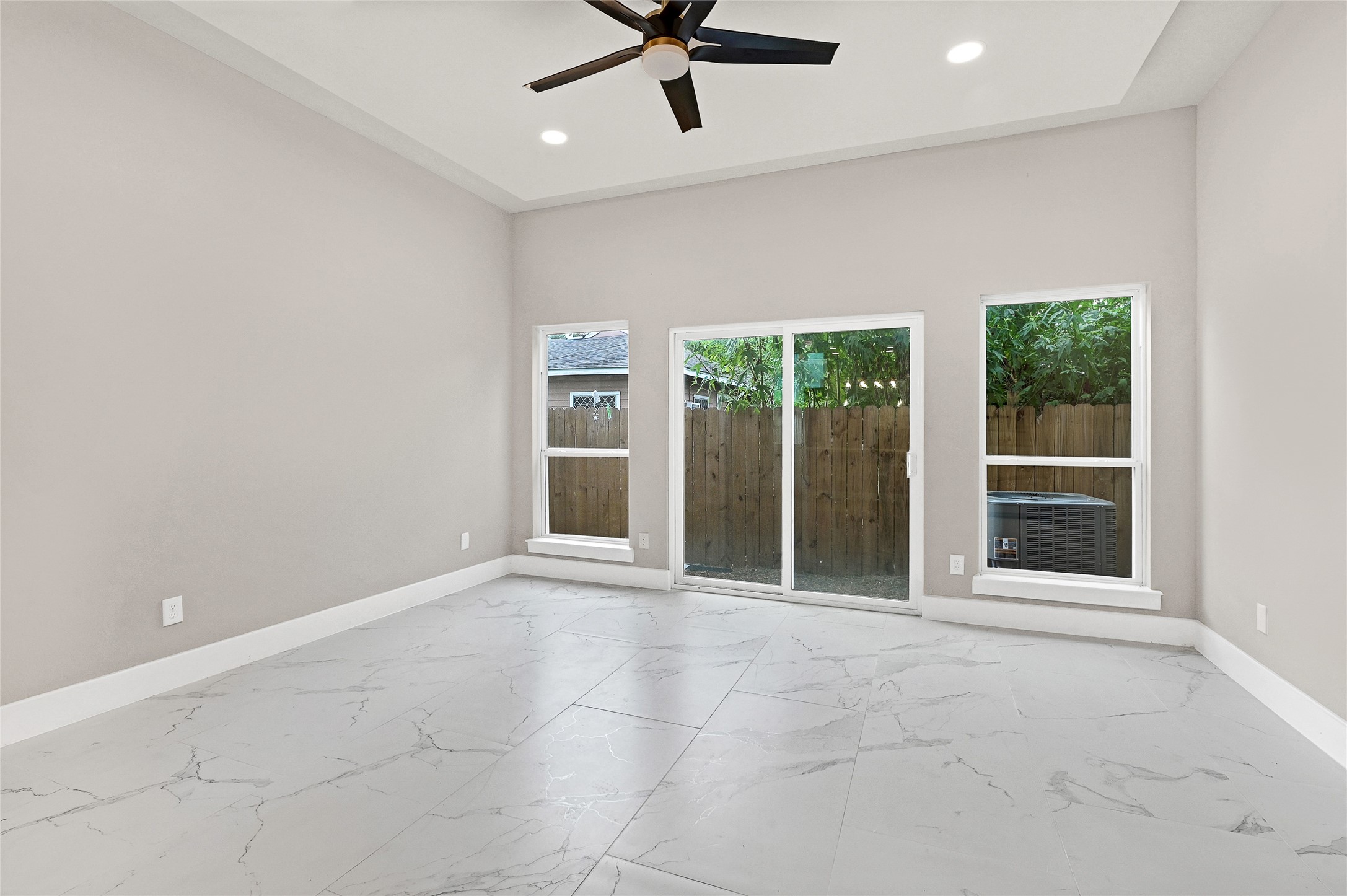 7938 Angus Street Houston, TX 77028 - Photo 10 of 25 a view of an empty room with a window