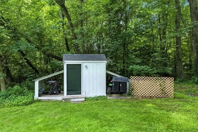a view of a house with a garden