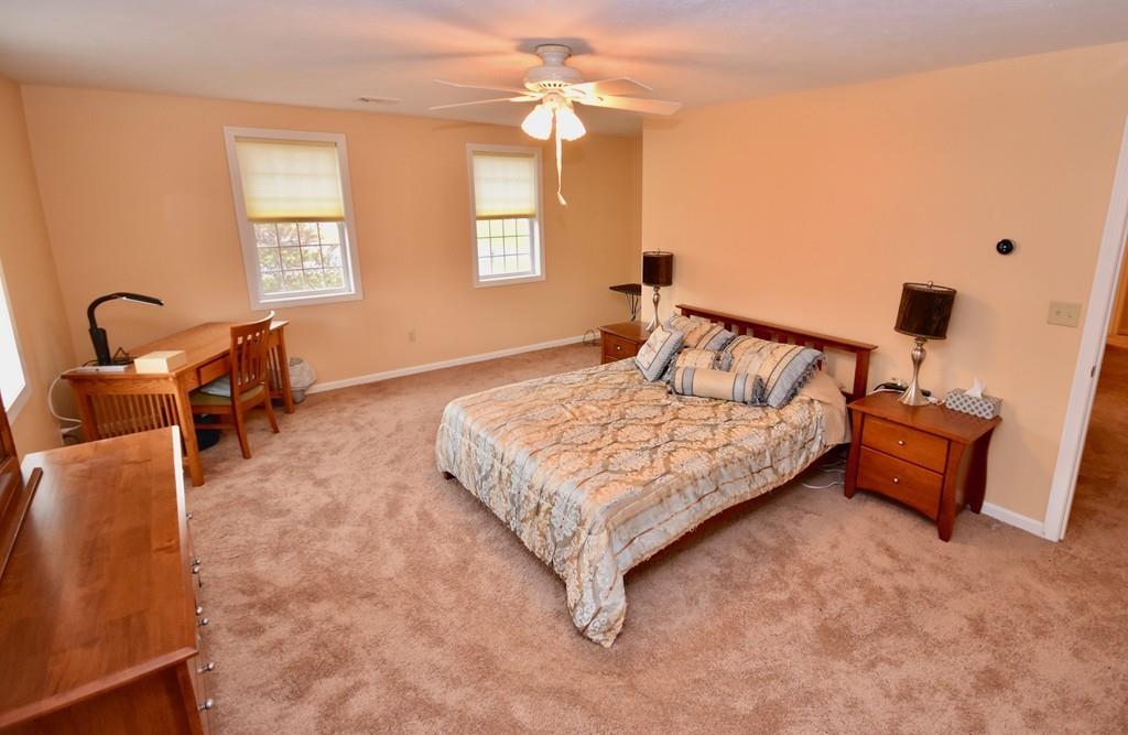 152 Plumtree Road Sunderland, MA 01375 - Photo 17 of 34 a bedroom with a bed chair and window