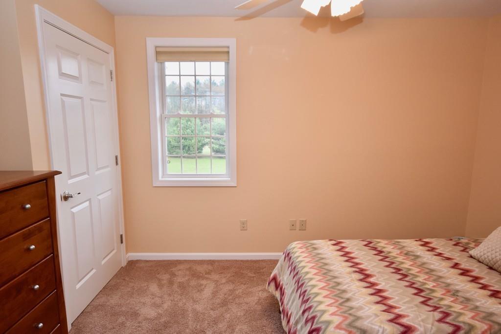 152 Plumtree Road Sunderland, MA 01375 - Photo 23 of 34 a bedroom with a bed and a window