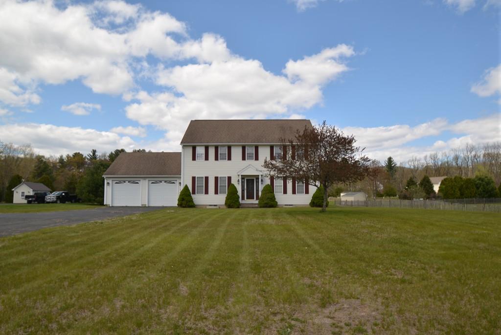 152 Plumtree Road Sunderland, MA 01375 - Photo 34 of 34 a view of a big house with a big yard and large trees