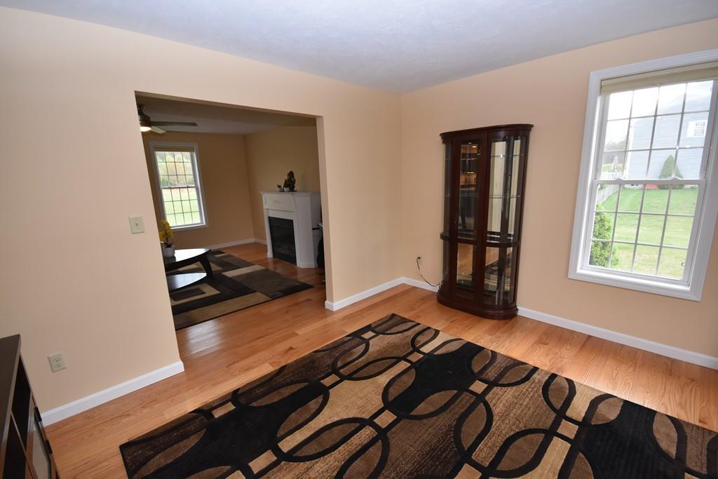 152 Plumtree Road Sunderland, MA 01375 - Photo 6 of 34 a bedroom with a bed and wooden floor