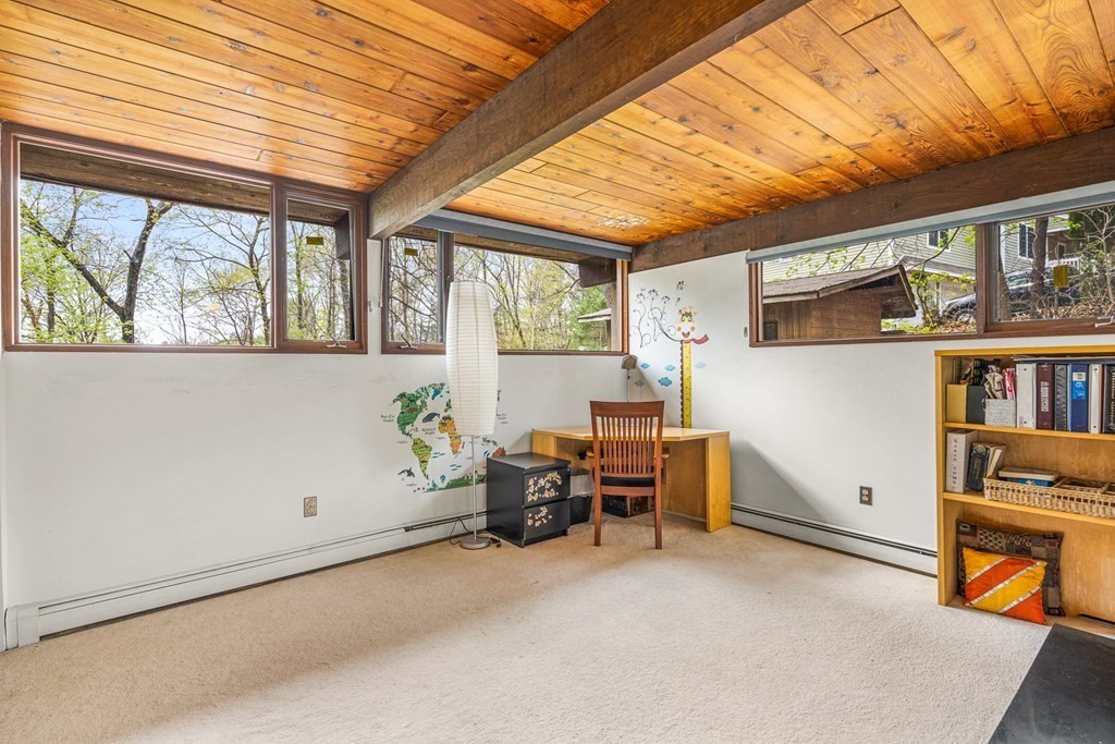65 Spring Grove Road Andover, MA 01810 - Photo 27 of 41 a room with furniture and window