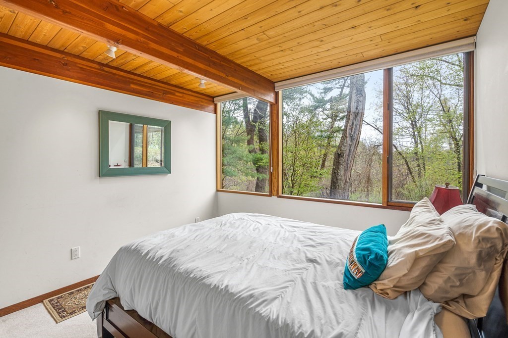 65 Spring Grove Road Andover, MA 01810 - Photo 31 of 41 a bedroom with a bed and a bed