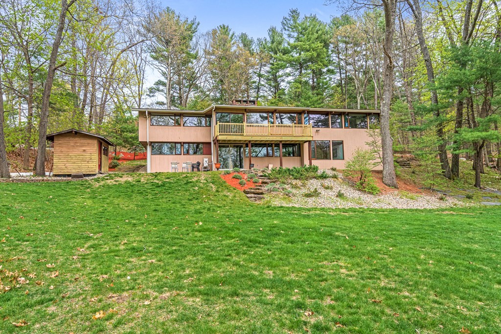 65 Spring Grove Road Andover, MA 01810 - Photo 40 of 41 a view of a house with pool and a yard