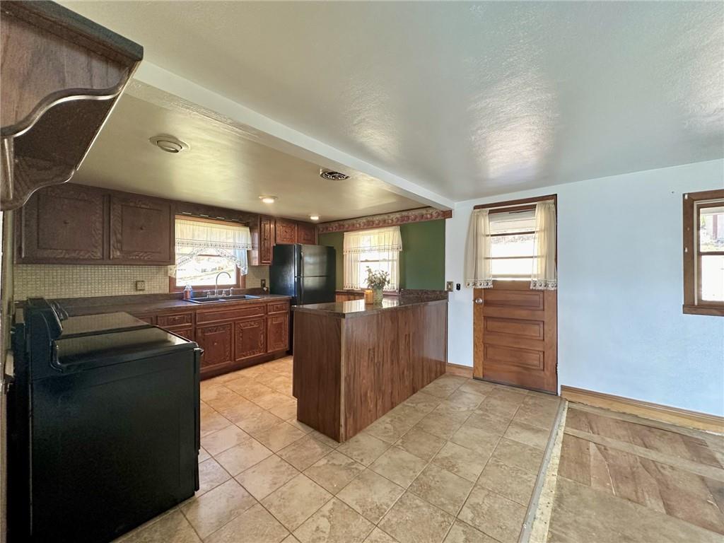 1281 Old State Road Apollo, PA 15613 - Photo 14 of 29 a view of kitchen with refrigerator cabinets and furniture