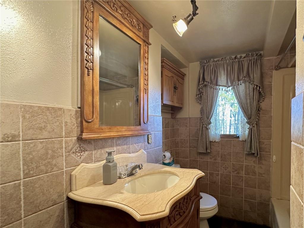 1281 Old State Road Apollo, PA 15613 - Photo 20 of 29 a bathroom with a sink toilet and shower