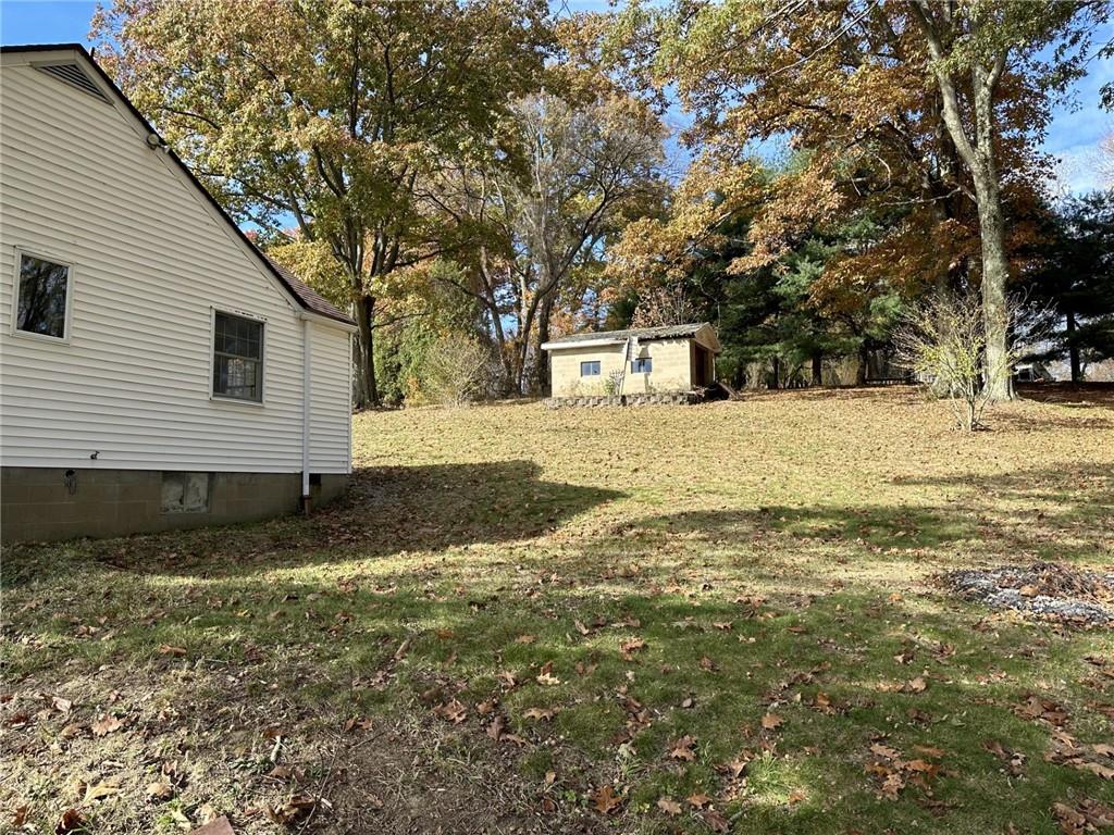 1281 Old State Road Apollo, PA 15613 - Photo 7 of 29 a front view of a house with a yard