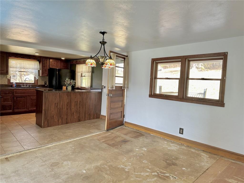 1281 Old State Road Apollo, PA 15613 - Photo 9 of 29 a view of a livingroom with a kitchen