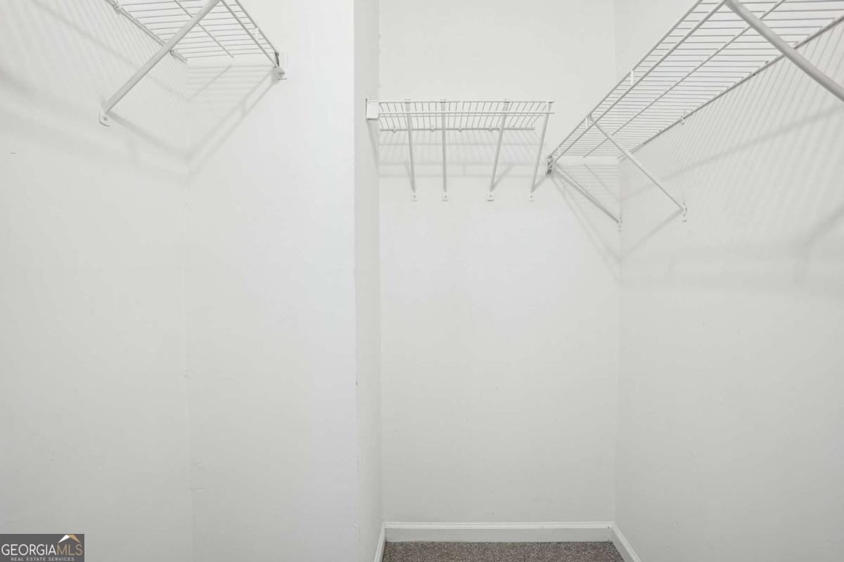 2049 Charter Lane Lithonia, GA 30058 - Photo 14 of 25 a view of small space with empty racks