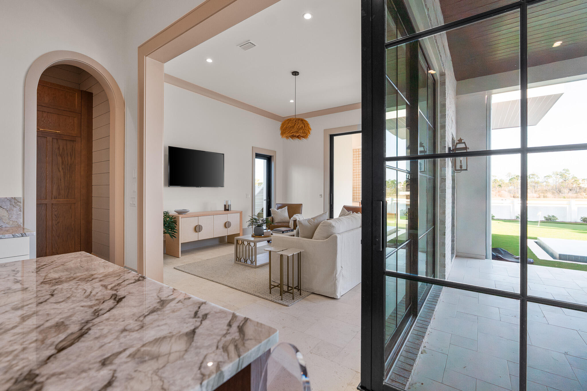 92 Quail Hollow Inlet Beach, FL 32461 - Photo 107 of 119 a bedroom with furniture a flat screen tv and a large window