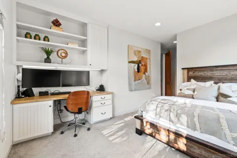 a kitchen with stainless steel appliances a sink stove and cabinets