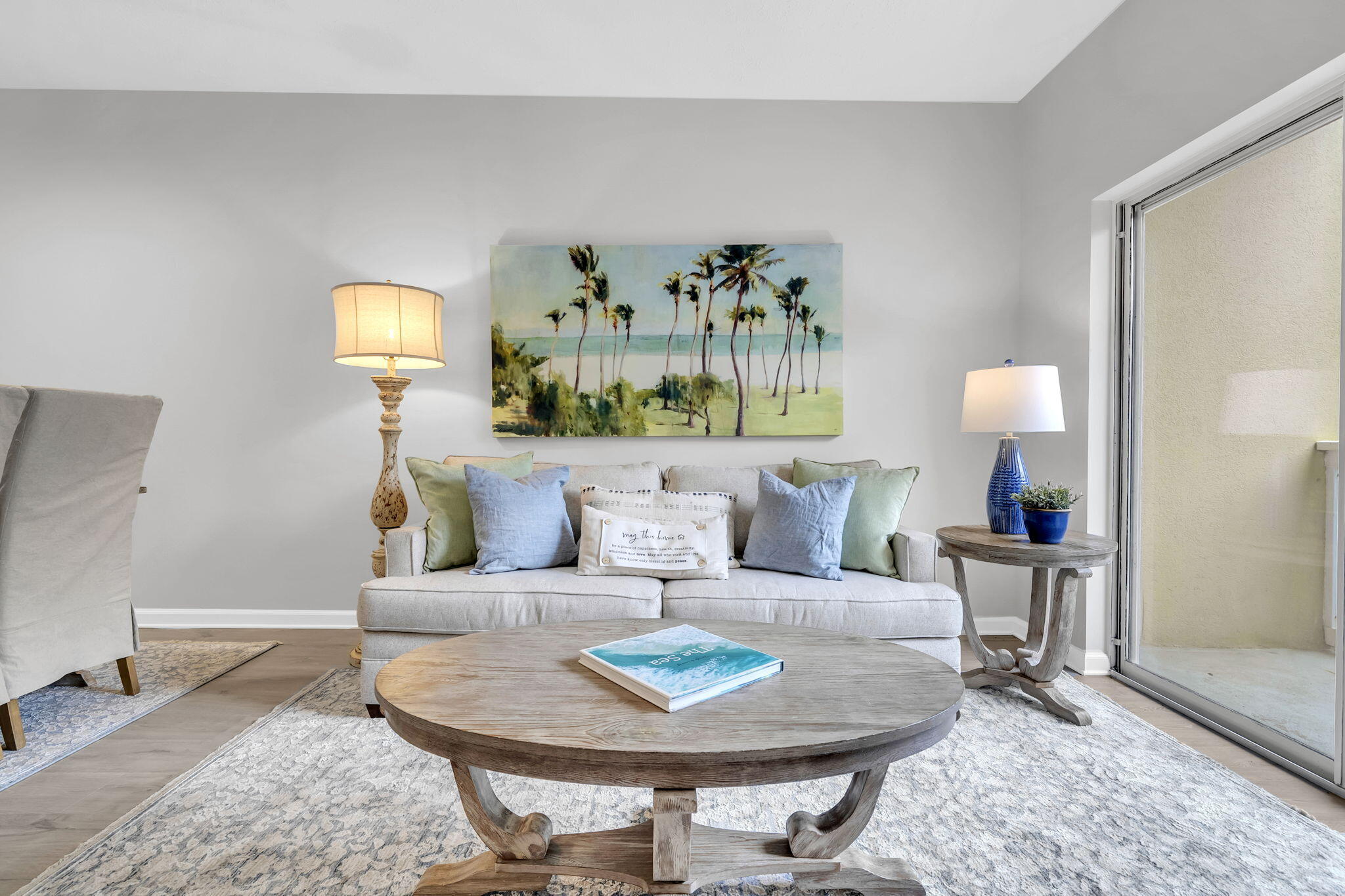 34 Heron's Watch Way, Unit 1202 Santa Rosa Beach, FL 32459 - Photo 13 of 36 a living room with furniture and painting on the wall