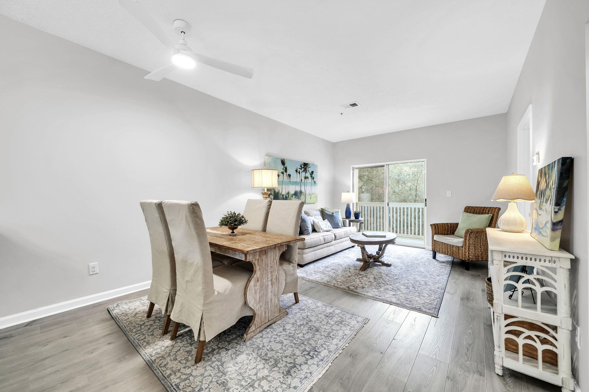 34 Heron's Watch Way, Unit 1202 Santa Rosa Beach, FL 32459 - Photo 14 of 36 a living room with furniture and a table