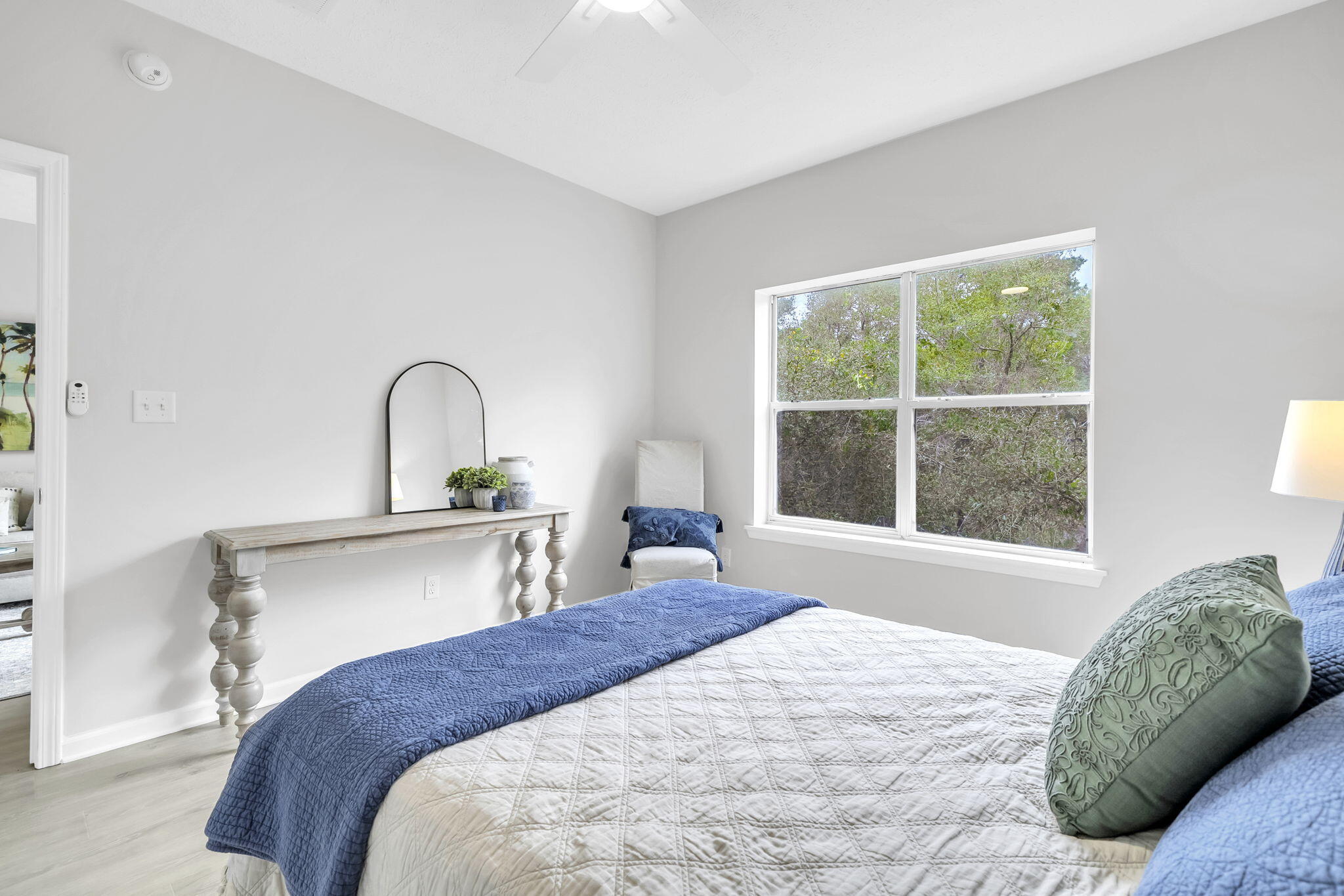 34 Heron's Watch Way, Unit 1202 Santa Rosa Beach, FL 32459 - Photo 20 of 36 a bedroom with a bed and a window