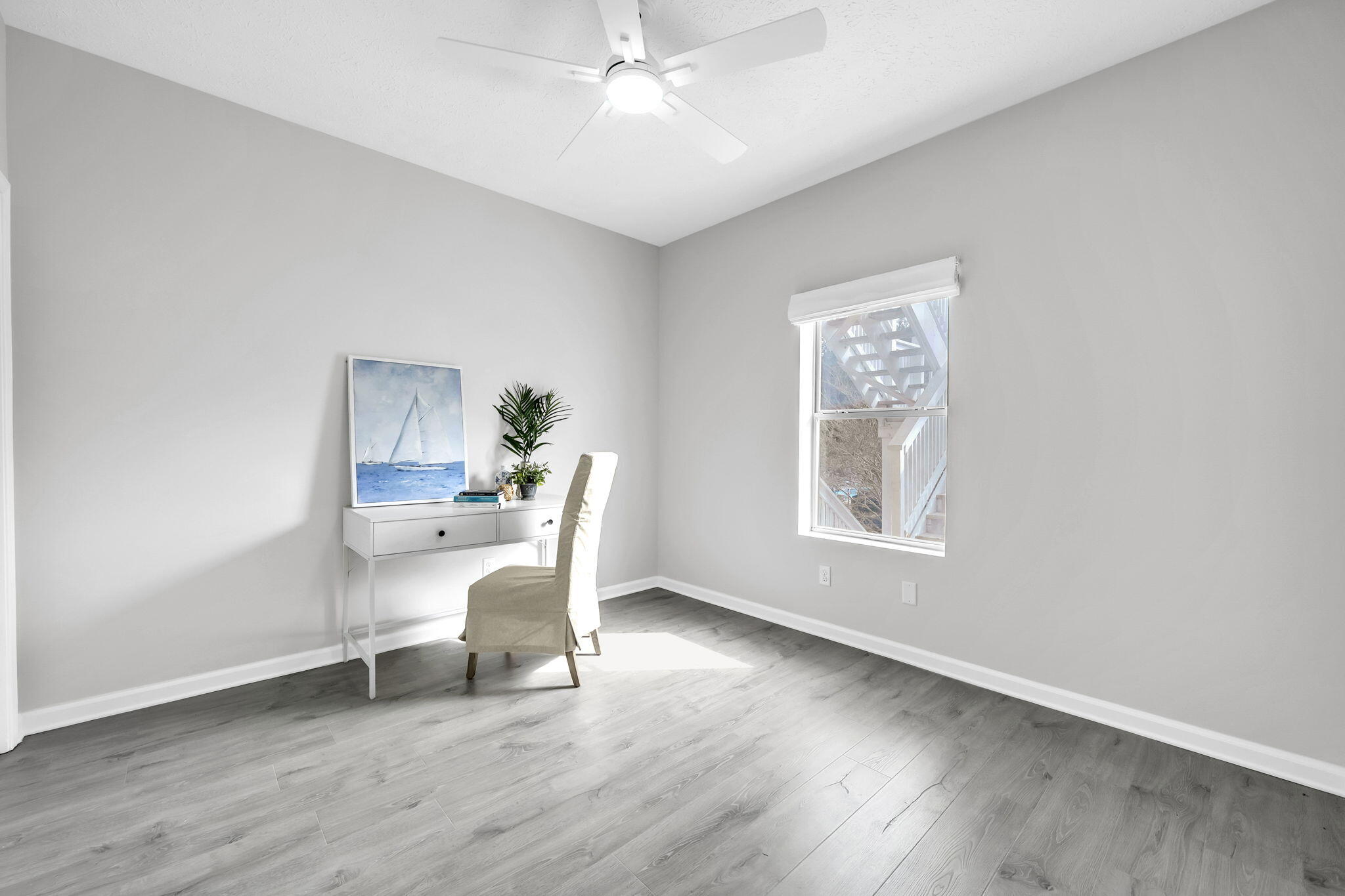 34 Heron's Watch Way, Unit 1202 Santa Rosa Beach, FL 32459 - Photo 22 of 36 a living room with furniture and a window
