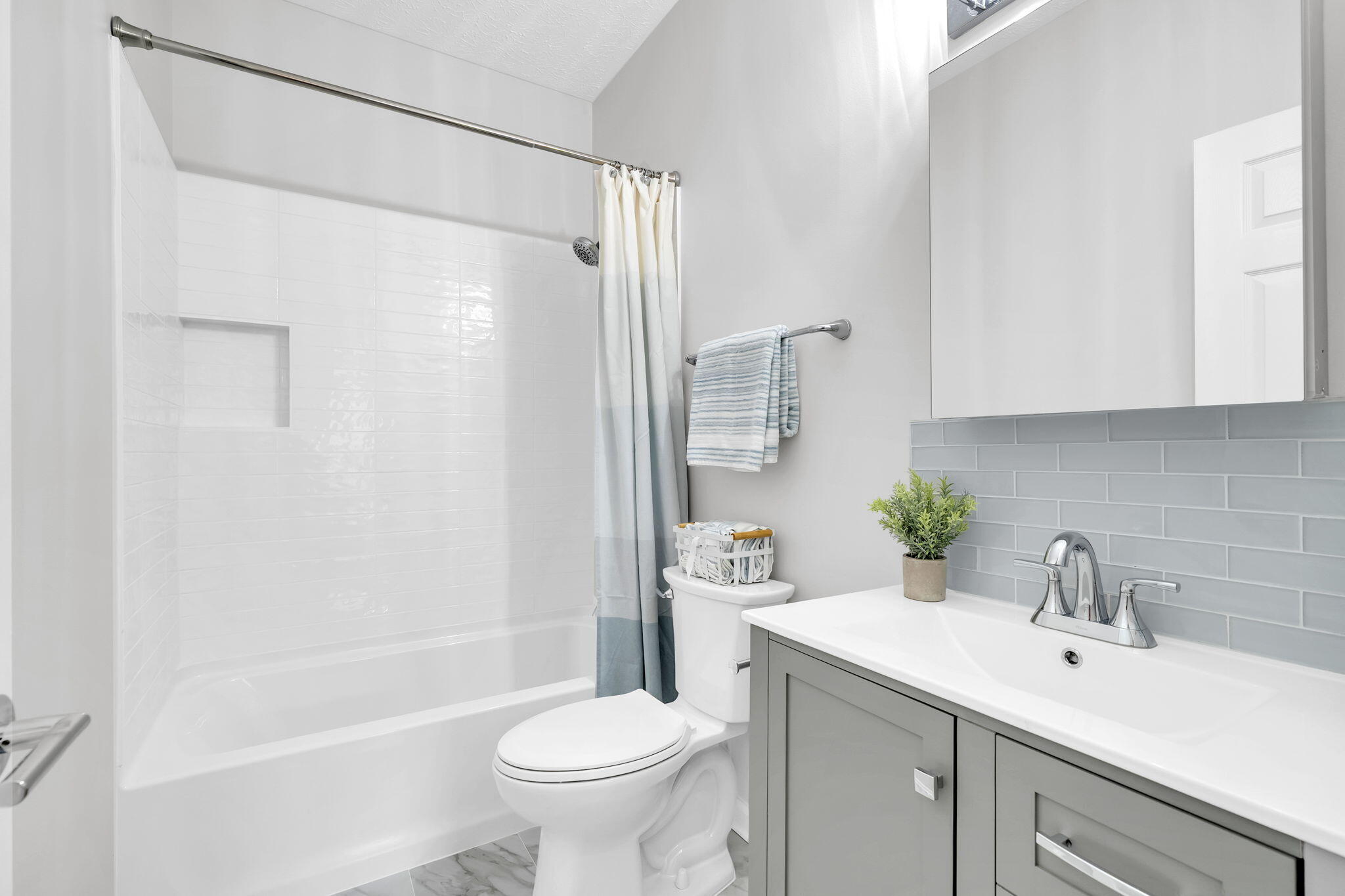 34 Heron's Watch Way, Unit 1202 Santa Rosa Beach, FL 32459 - Photo 25 of 36 a bathroom with a sink toilet and shower