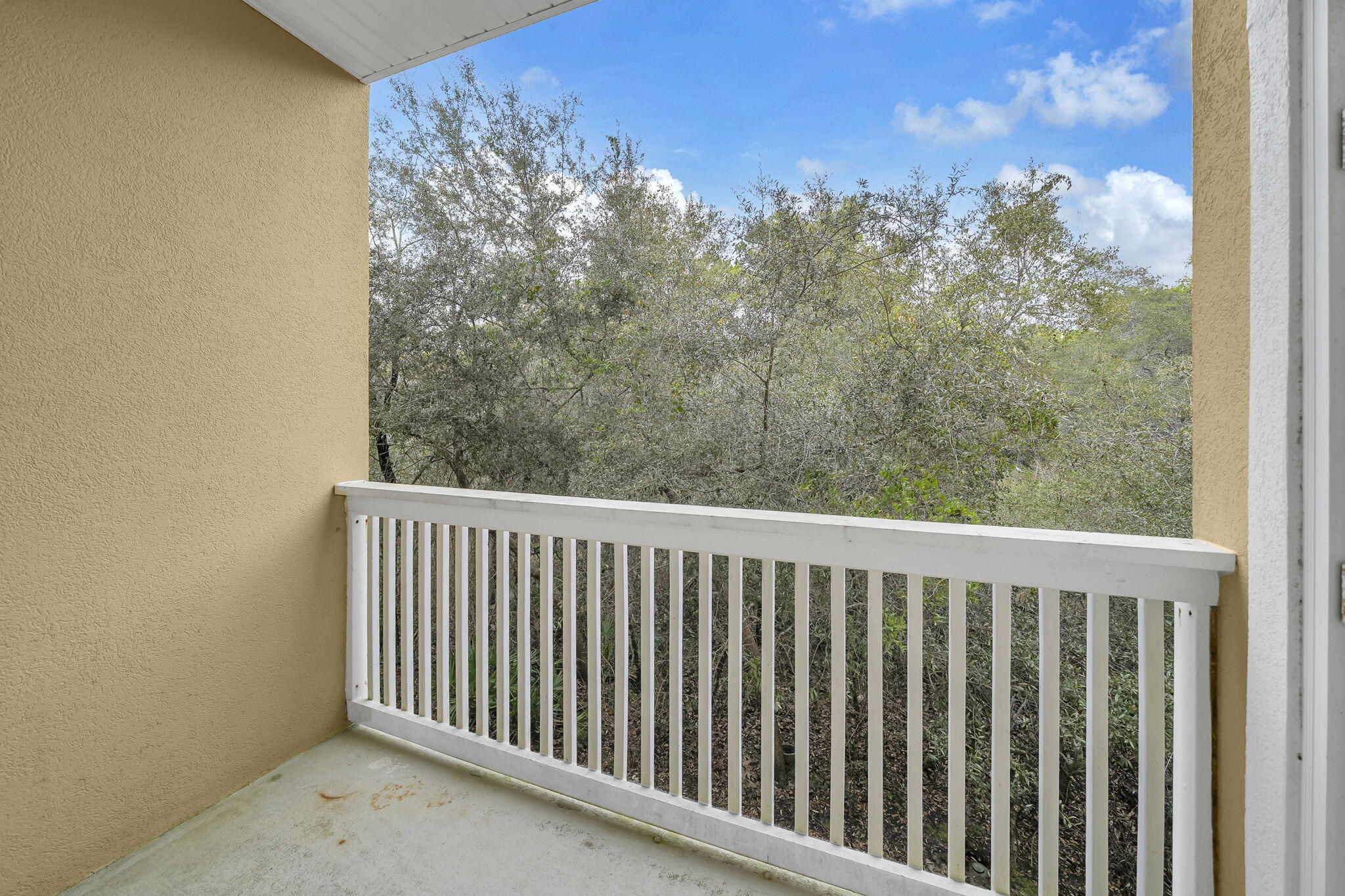 34 Heron's Watch Way, Unit 1202 Santa Rosa Beach, FL 32459 - Photo 28 of 36 a view of a balcony with wooden fence