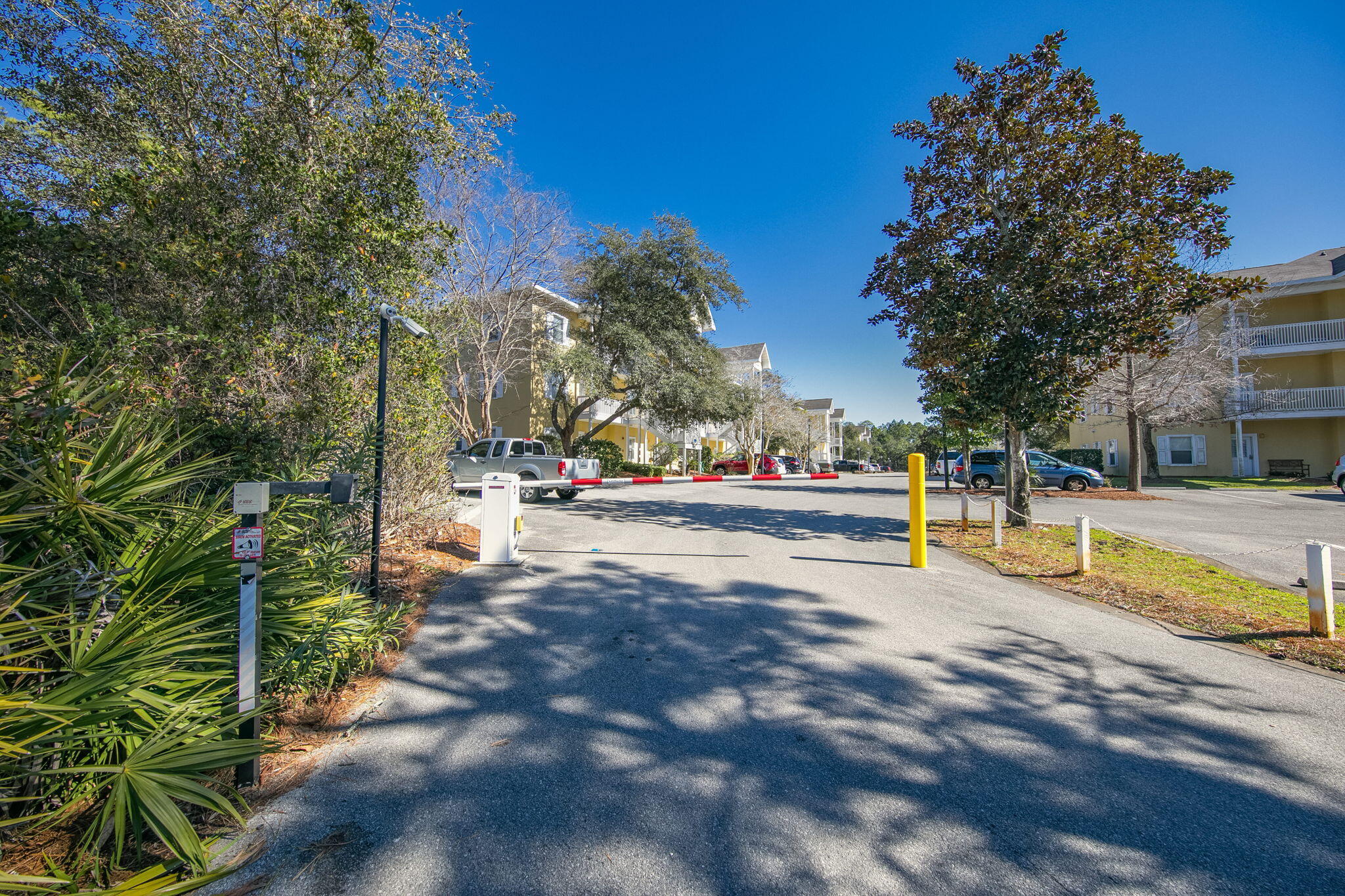 34 Heron's Watch Way, Unit 1202 Santa Rosa Beach, FL 32459 - Photo 34 of 36 a swimming pool with outdoor seating and yard