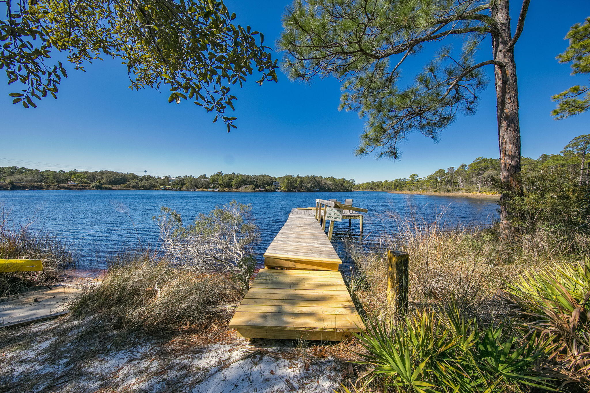 34 Heron's Watch Way, Unit 1202 Santa Rosa Beach, FL 32459 - Photo 4 of 36 a view of a lake with houses