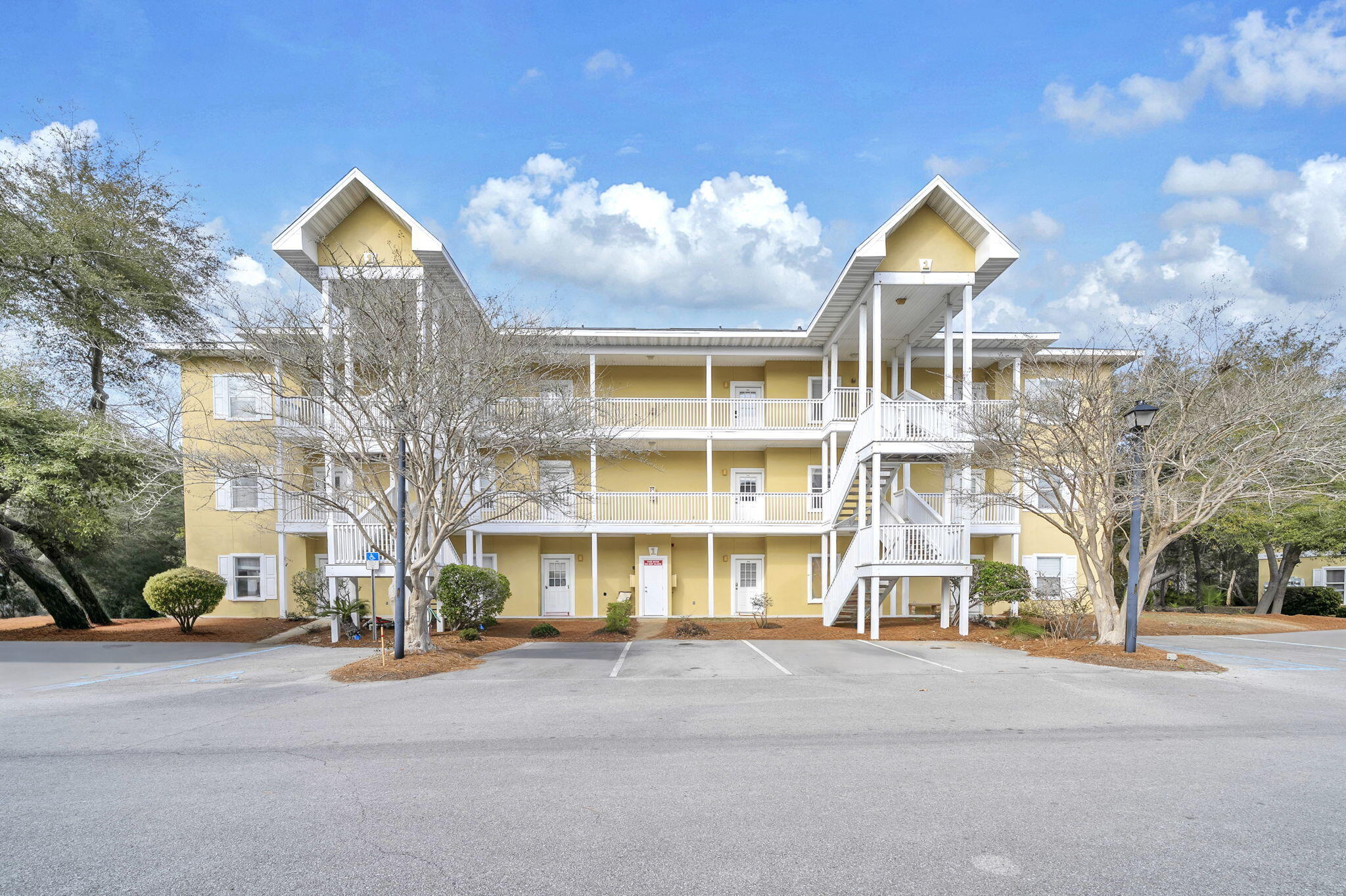 34 Heron's Watch Way, Unit 1202 Santa Rosa Beach, FL 32459 - Photo 6 of 36 a view of a building with a street