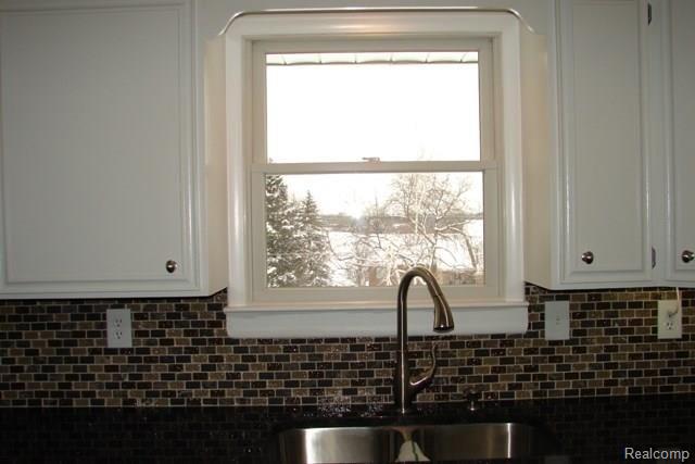 1426 Pebble Creek Road Metamora, MI 48455 - Photo 10 of 24 Kitchen looking out to lake.jpg