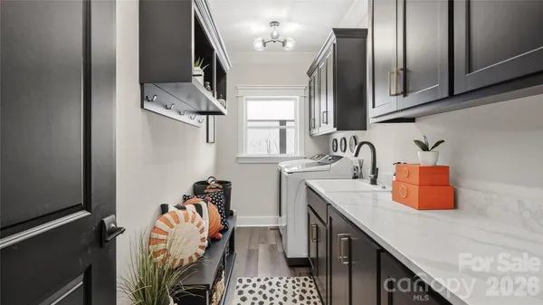 a bathroom with a tub and a sink