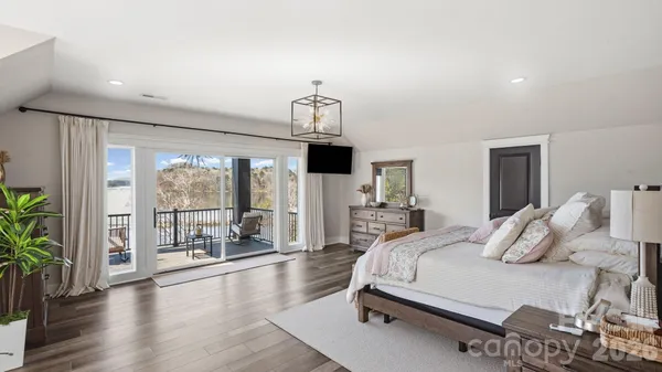 a living room with fireplace furniture and a flat screen tv