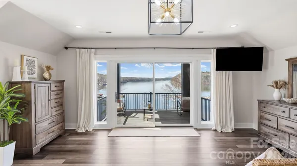 a view of balcony with furniture