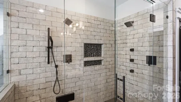 a bathroom with a sink double vanity and a mirror
