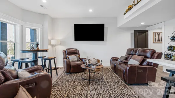 a kitchen with a sink and a refrigerator