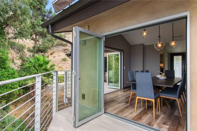 a view of a dining room and chairs