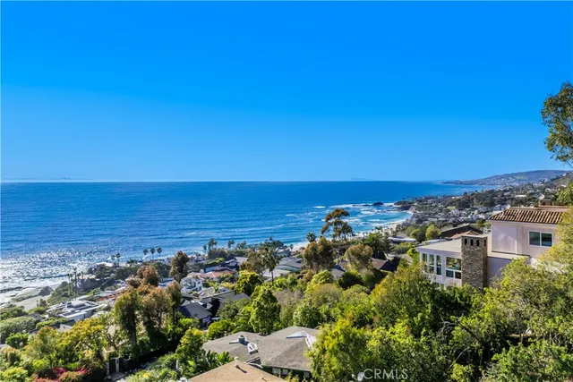 a view of a city with an ocean