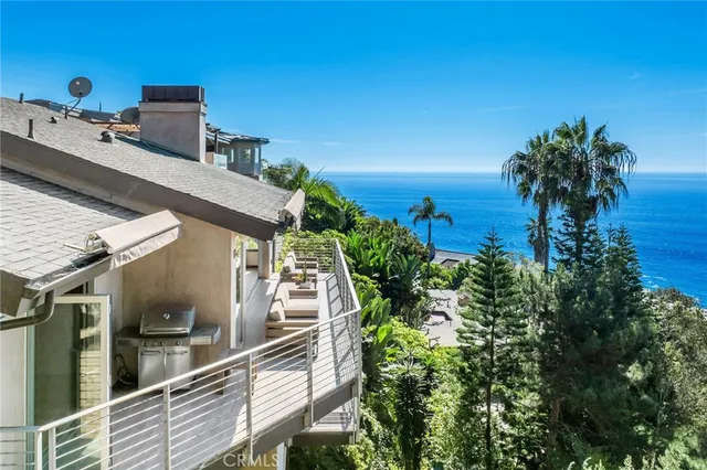 a view of a dry yard with mountains