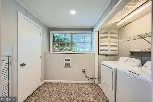 a storage room with a washer and dryer