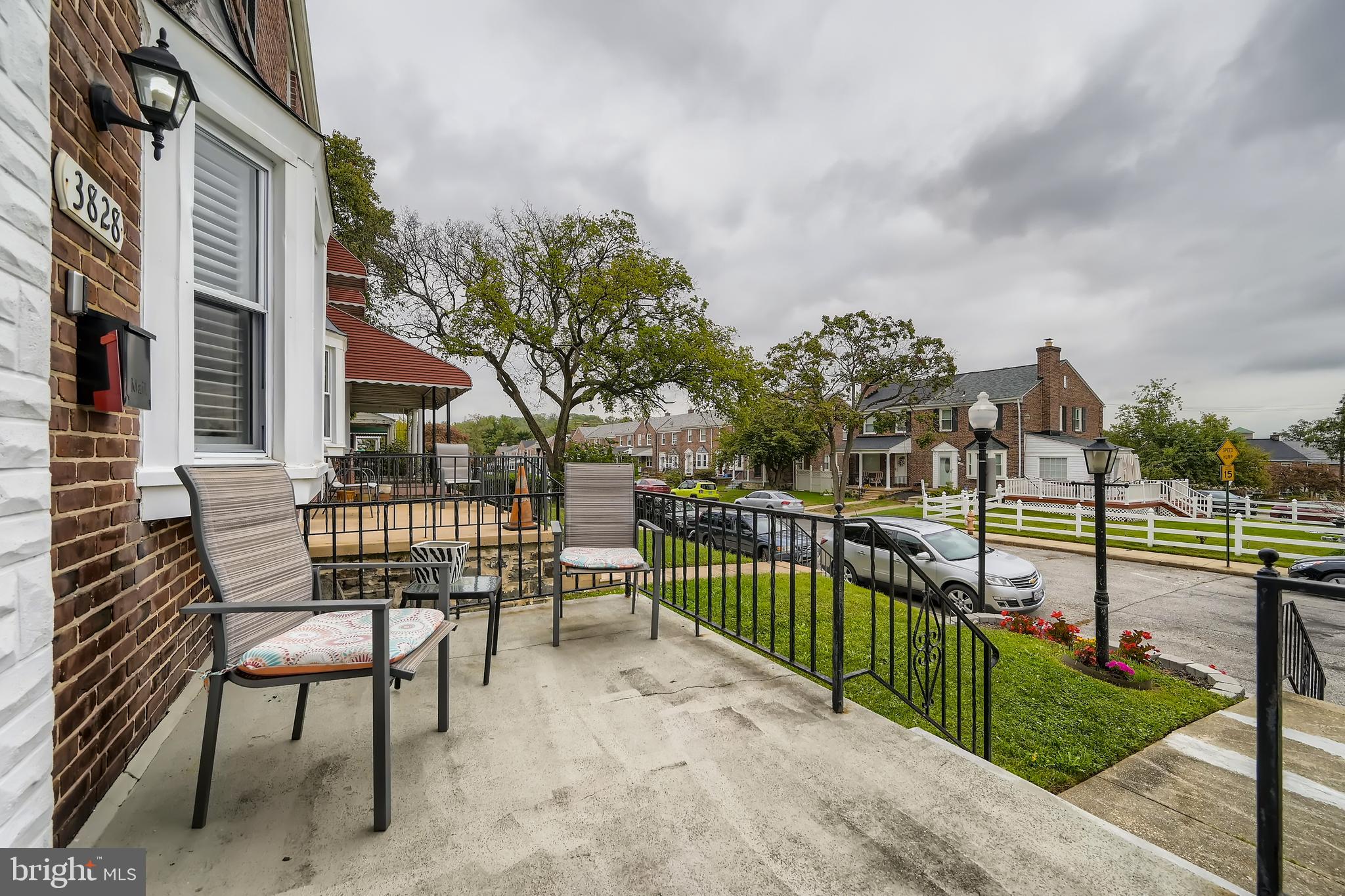 3828 Ednor Road Baltimore, MD 21218 - Photo 4 of 27 a view of a chair and table on the terrace