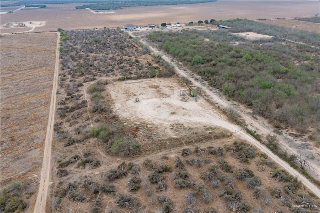 1 Iowa Road Edinburg, TX 78541 - Photo 4 of 4 a view of a dry yard with mountains and green space
