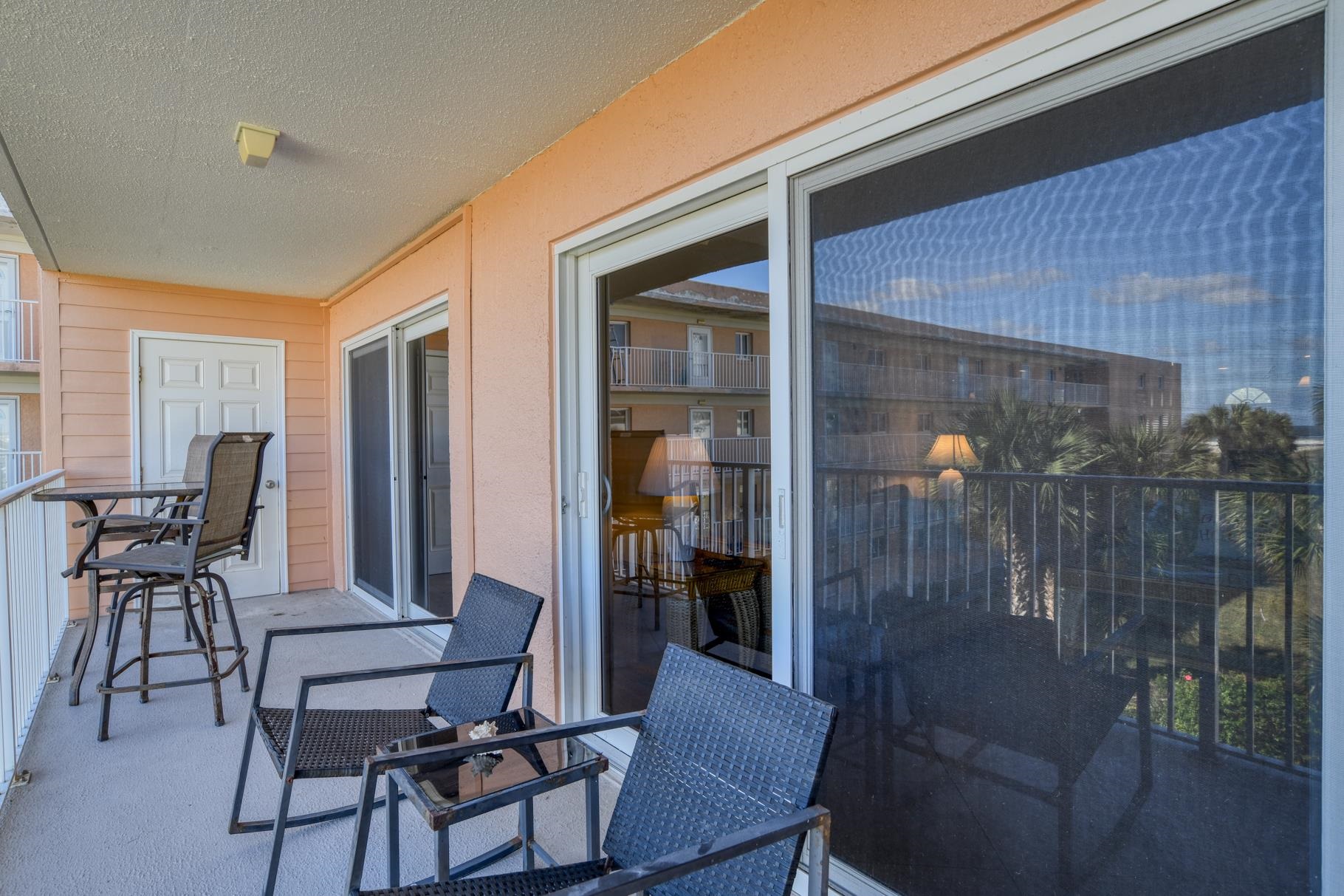 4 Ocean Trace Road, Unit 323 St. Augustine Beach, FL 32080 - Photo 12 of 37 a outdoor space with chairs